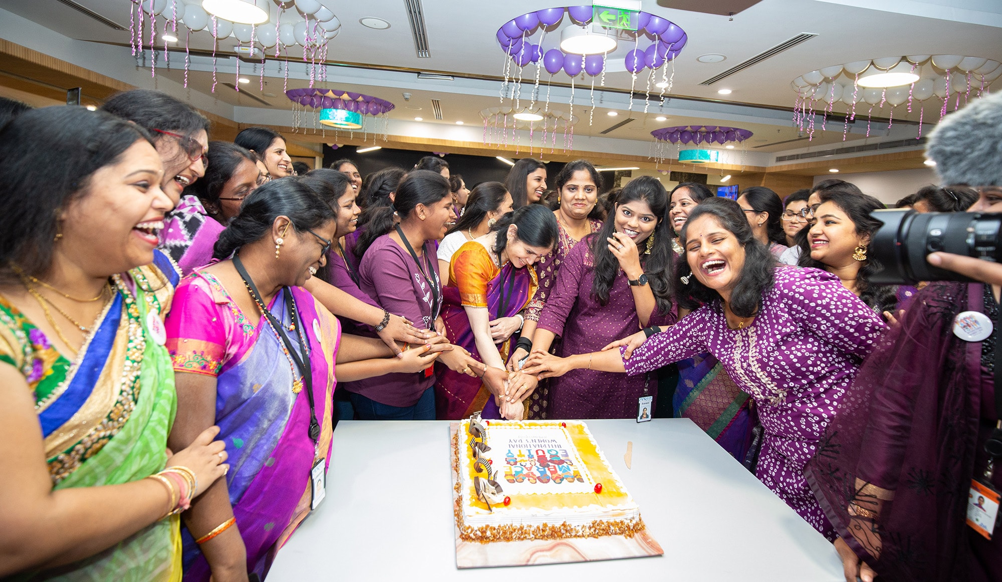 ɫTV employees celebrating a birthday